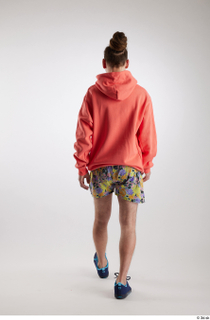 Nigel 1 back view blue sneakers dressed floral printed shorts…